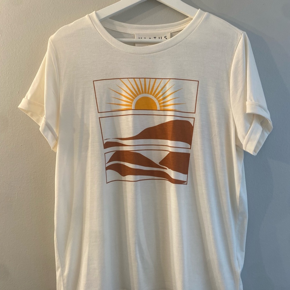 Cream Graphic Tee with Sun and Mountain Design